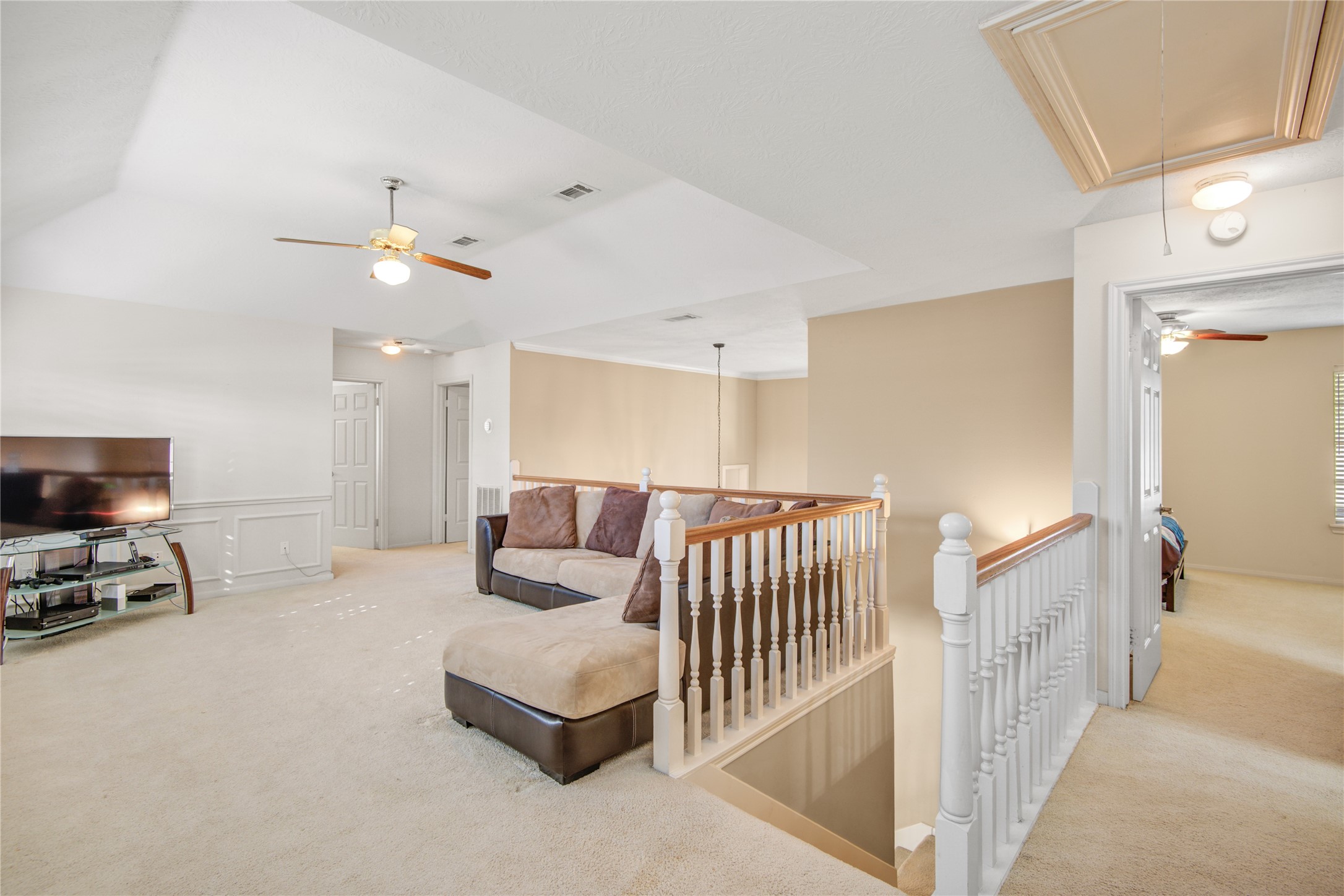 13215 Jessica Lane Houston, TX 77069 - Photo 19 of 33 The upstairs game room offers a spacious, flexible area ideal for relaxing, entertaining, or everyday use.