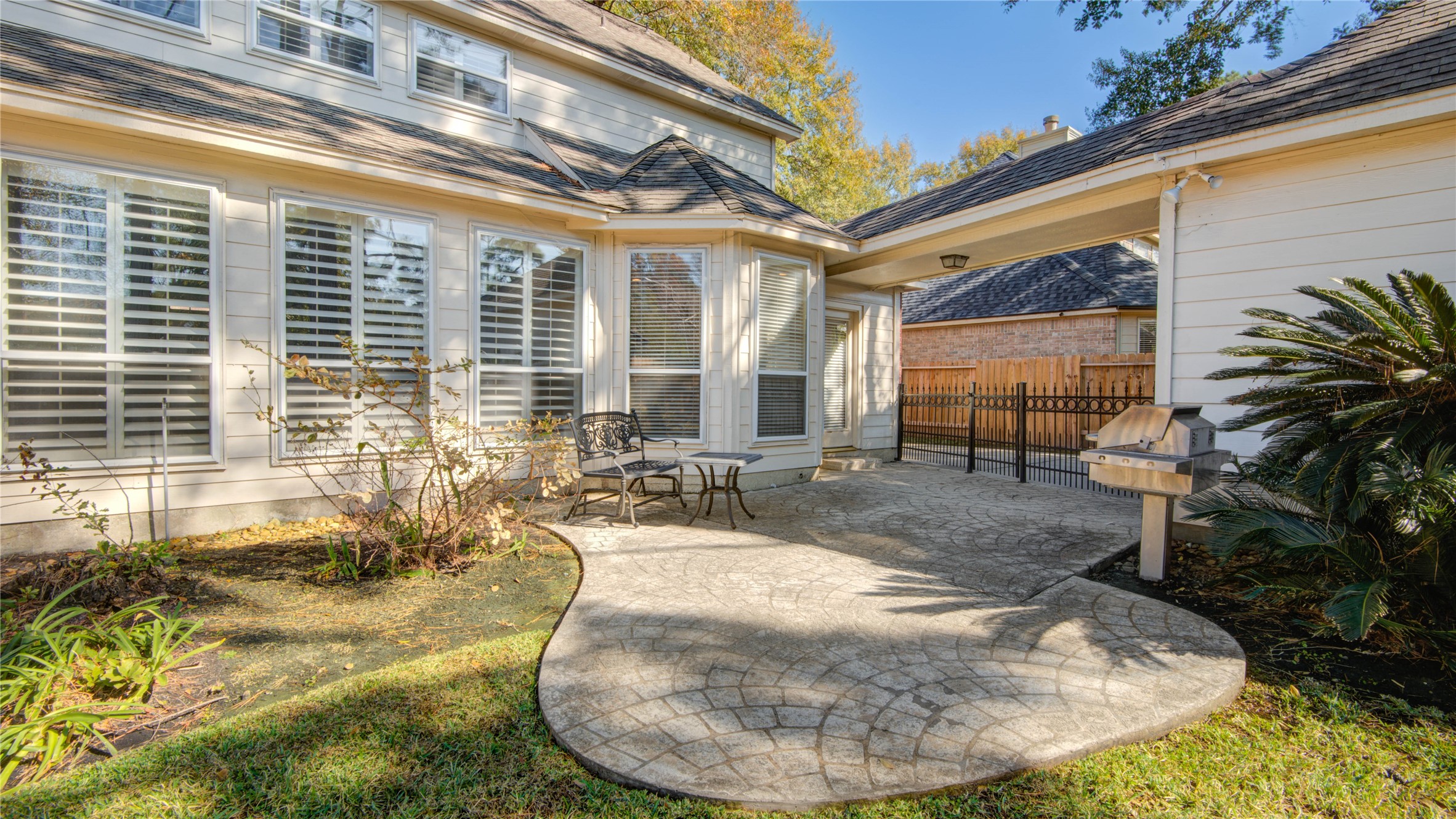 13215 Jessica Lane Houston, TX 77069 - Photo 26 of 33 This patio creates an easy outdoor living area connected to the home.