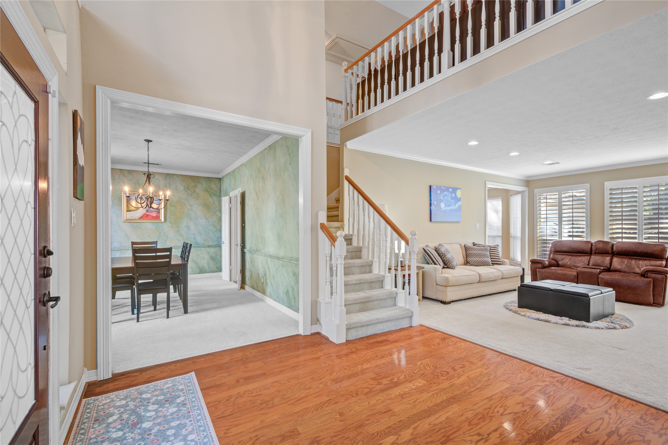 13215 Jessica Lane Houston, TX 77069 - Photo 6 of 33 An open transition from the foyer to the dining space adds to the home’s comfortable, connected layout.