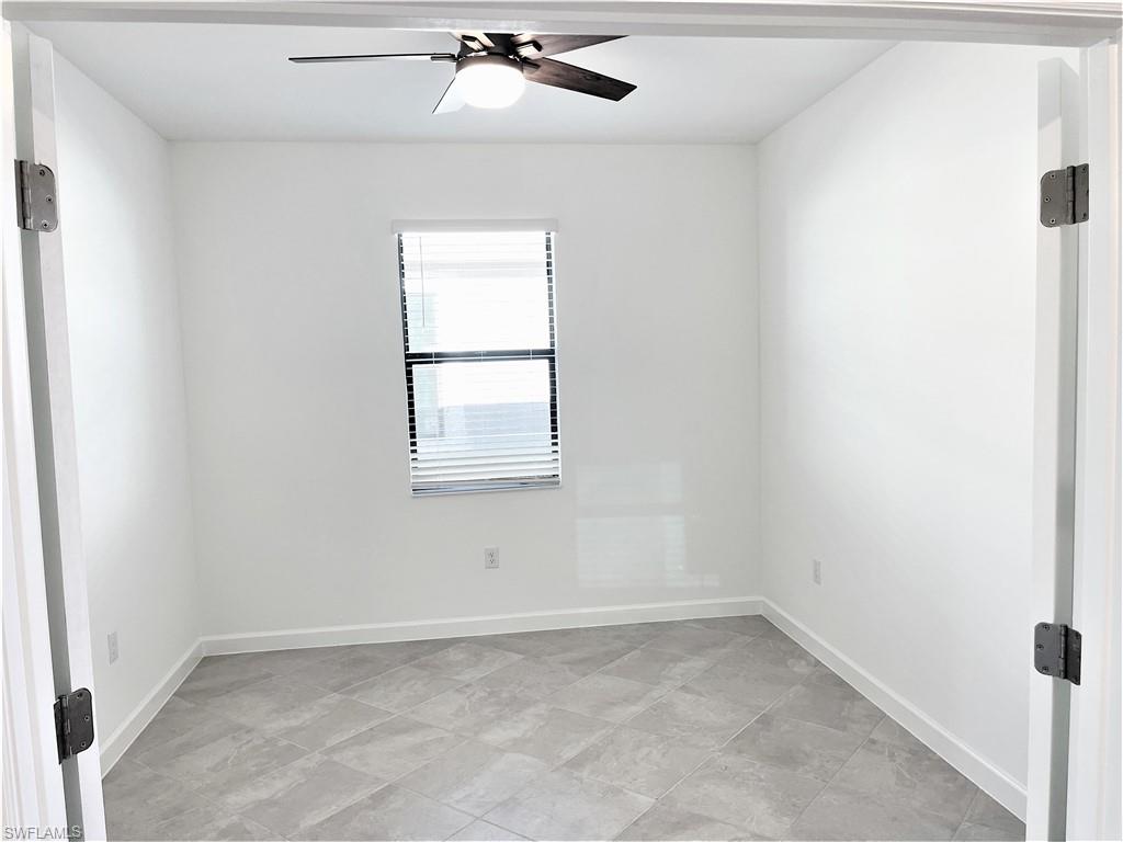 11163 Canopy Loop Fort Myers, FL 33913 - Photo 10 of 16 Empty room with ceiling fan and baseboards