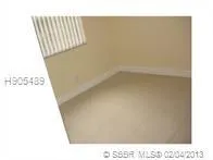 a picture of a bathroom with a shower curtain