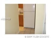 a picture of a bathroom with a shower