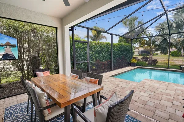 a view of yard with patio