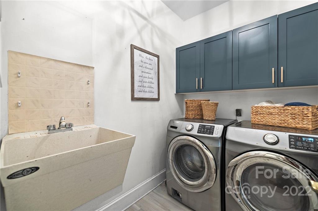 166 Lake Pointe Drive Fort Mill, SC 29708 - Photo 19 of 42 a utility room with dryer and washer