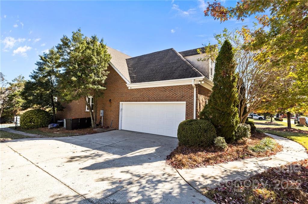 166 Lake Pointe Drive Fort Mill, SC 29708 - Photo 2 of 42 a front view of a house with a yard