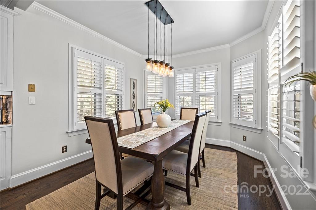 166 Lake Pointe Drive Fort Mill, SC 29708 - Photo 25 of 42 a view of a dining room with furniture window and wooden floor