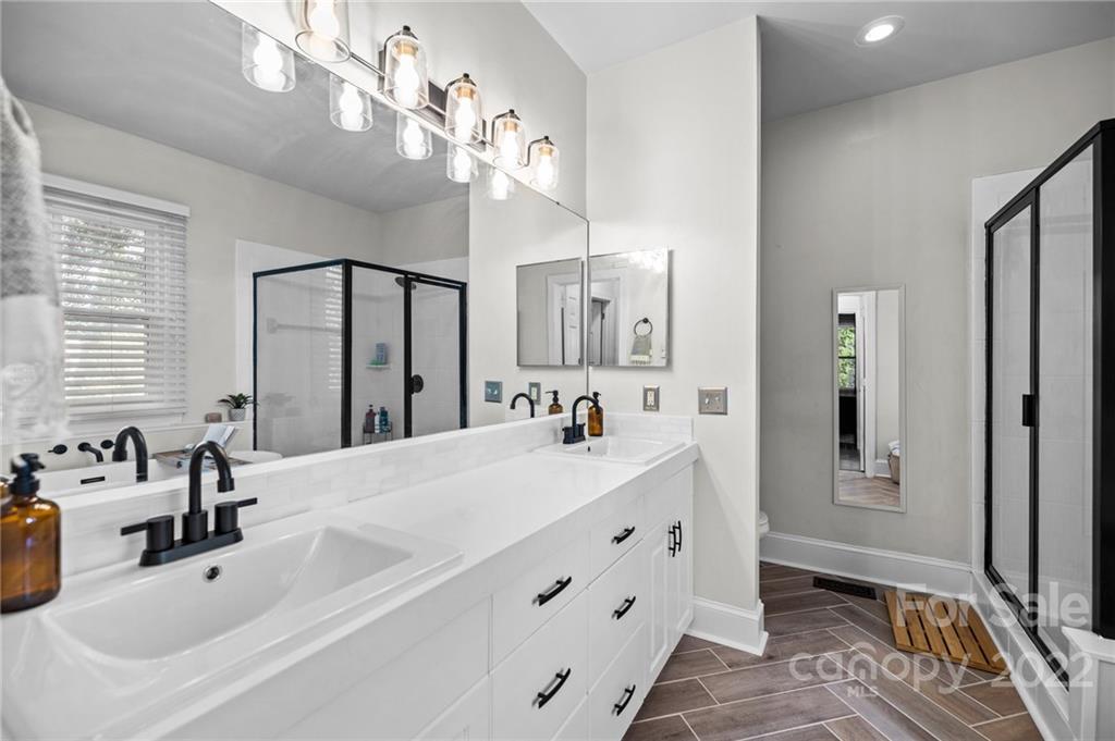 166 Lake Pointe Drive Fort Mill, SC 29708 - Photo 33 of 42 a bathroom with a double vanity sink mirror and double