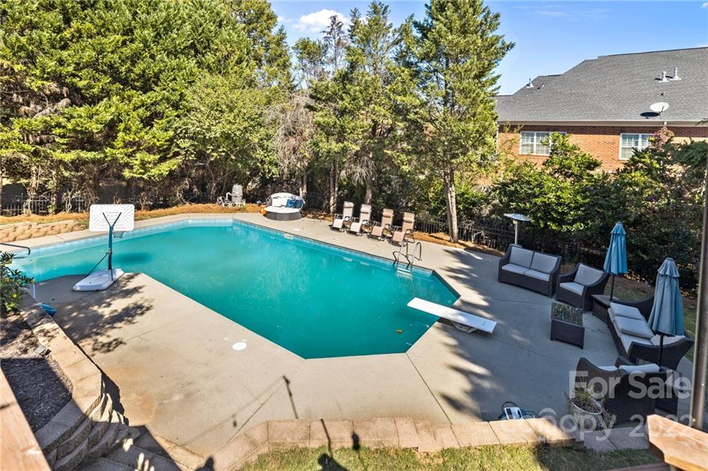 166 Lake Pointe Drive Fort Mill, SC 29708 - Photo 8 of 42 a view of a swimming pool with a patio