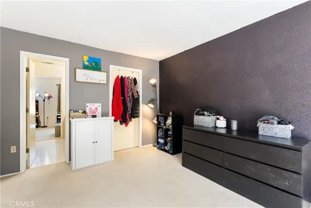 a white toilet sitting next to a shower curtain