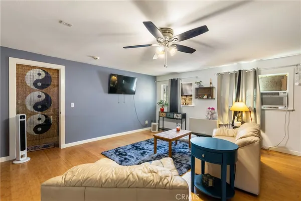 a bathroom with a toilet a sink and a mirror