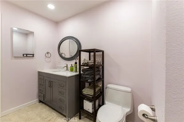 a view of a road with mountains in the background