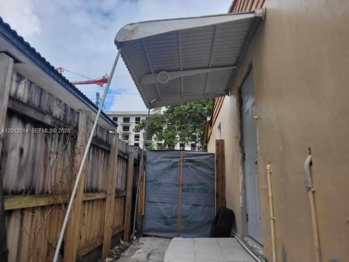 2385 Northeast 185th Street, Unit 1 Miami, FL 33180 - Photo 5 of 5 REAR ENTRY