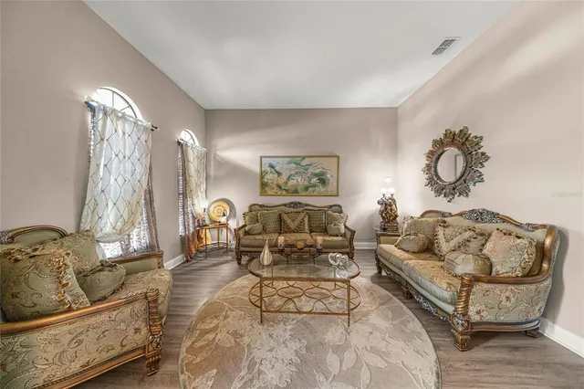 a living room with furniture and a couch