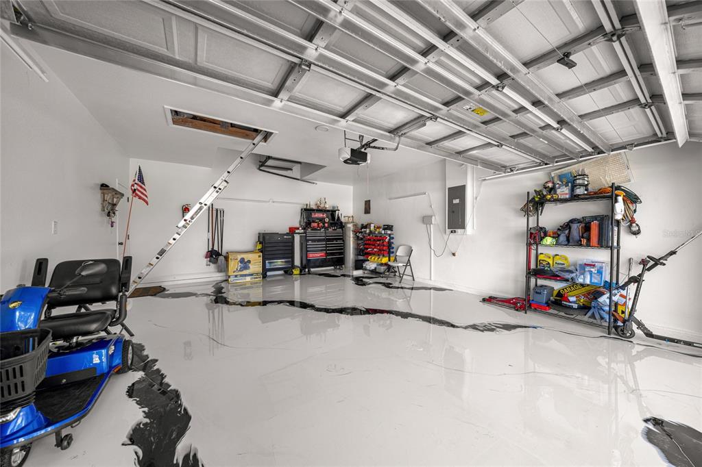 4590 Southwest 111th Place Ocala, FL 34476 - Photo 33 of 36 a view of a garage with storage