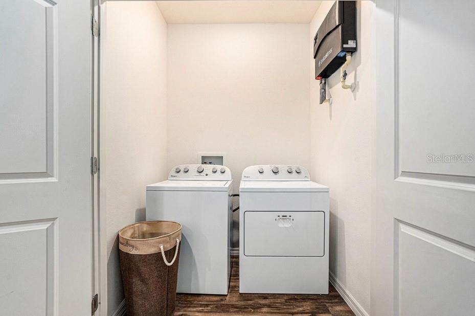 5521 Yellowfin Court New Port Richey, FL 34652 - Photo 16 of 23 a utility room with dryer and washer
