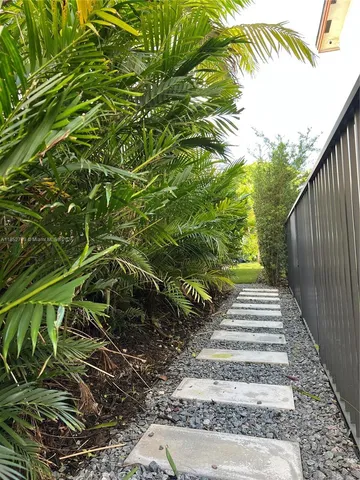 a view of a backyard with a slide