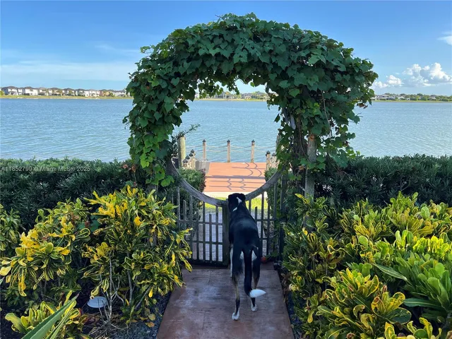 a view of a yard in front of house with a yard