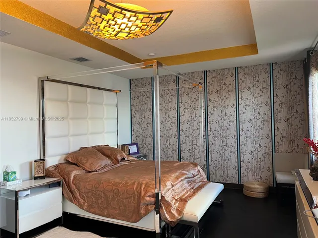 a bed room with a bed and a window