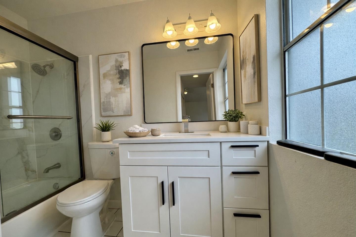 645 Dadis Way San Jose, CA 95111 - Photo 11 of 13 a bathroom with a sink toilet and shower