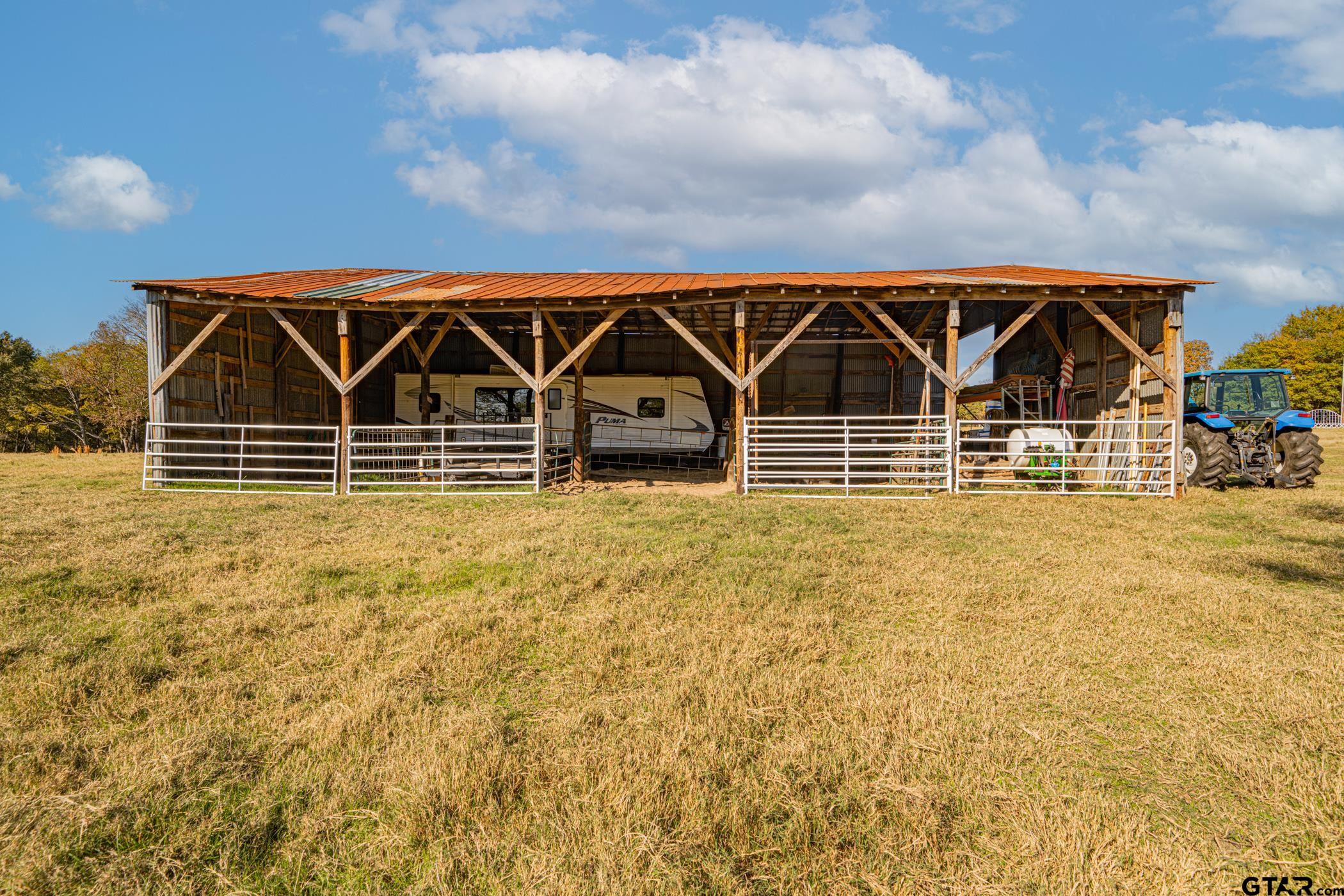 1855 Phillips Springs Road Gladewater, TX 75647 - Photo 19 of 36 a view of a garage
