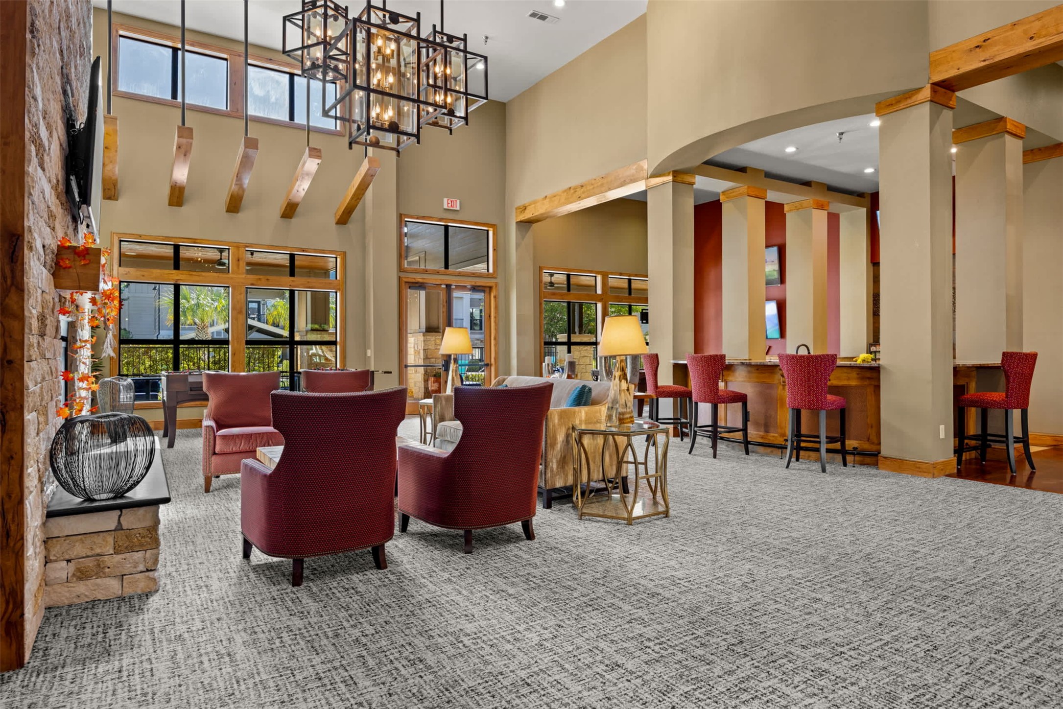 9308 South 1st Beach, Unit 231 Austin, TX 78748 - Photo 16 of 23 a living room with furniture a window and a chandelier