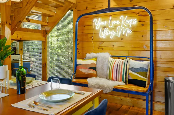 a living room with a table and a couch