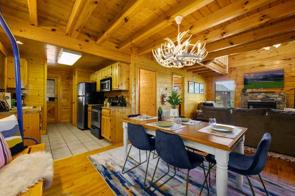 a kitchen with stainless steel appliances granite countertop a sink and cabinets
