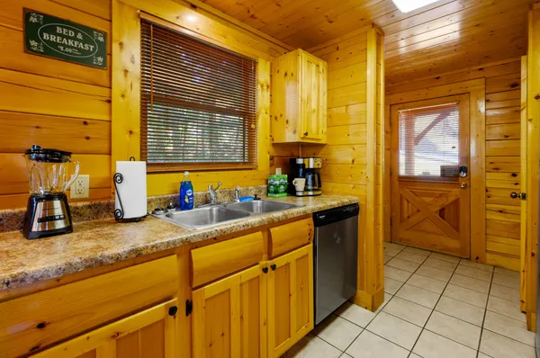 a kitchen with a stove and a microwave