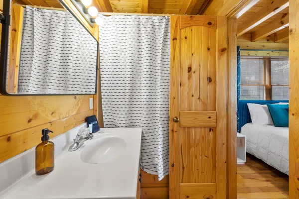 a view of a balcony with wooden floor