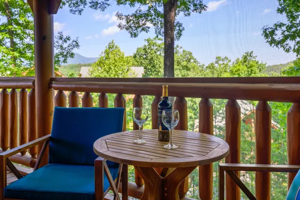a view of balcony with wooden floor