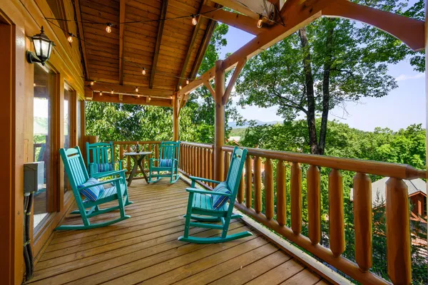 a view of a balcony with chairs