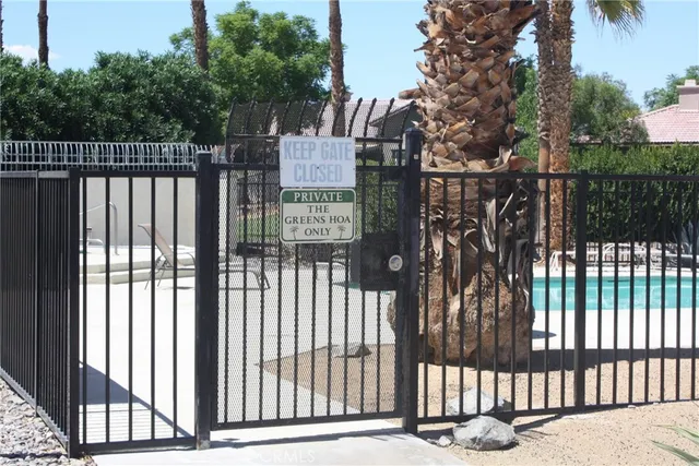a view of a gate with a iron gate