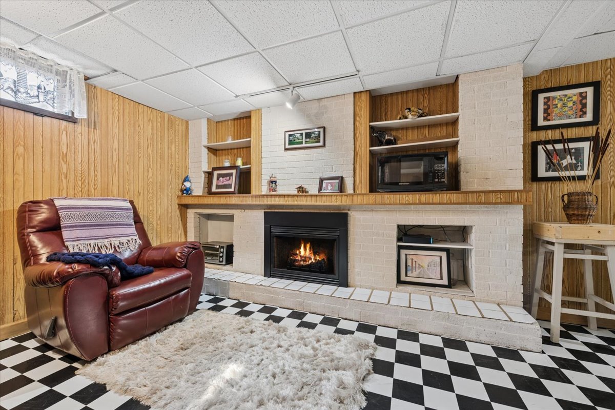 1702 Oak Street St. Charles, IL 60174 - Photo 15 of 20 a living room with furniture and a fireplace