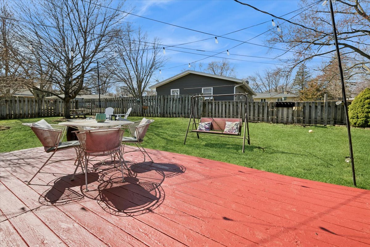1702 Oak Street St. Charles, IL 60174 - Photo 18 of 20 a patio with a yard table and chairs