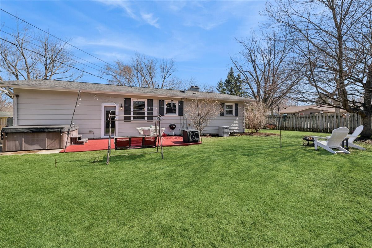 1702 Oak Street St. Charles, IL 60174 - Photo 19 of 20 a view of a house with a backyard
