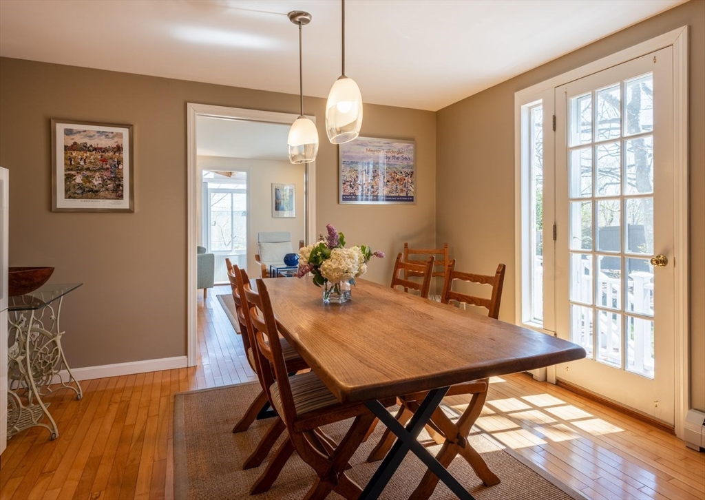 4 Graystone Road Gloucester, MA 01930 - Photo 13 of 34 a view of a dining room with furniture window and wooden floor