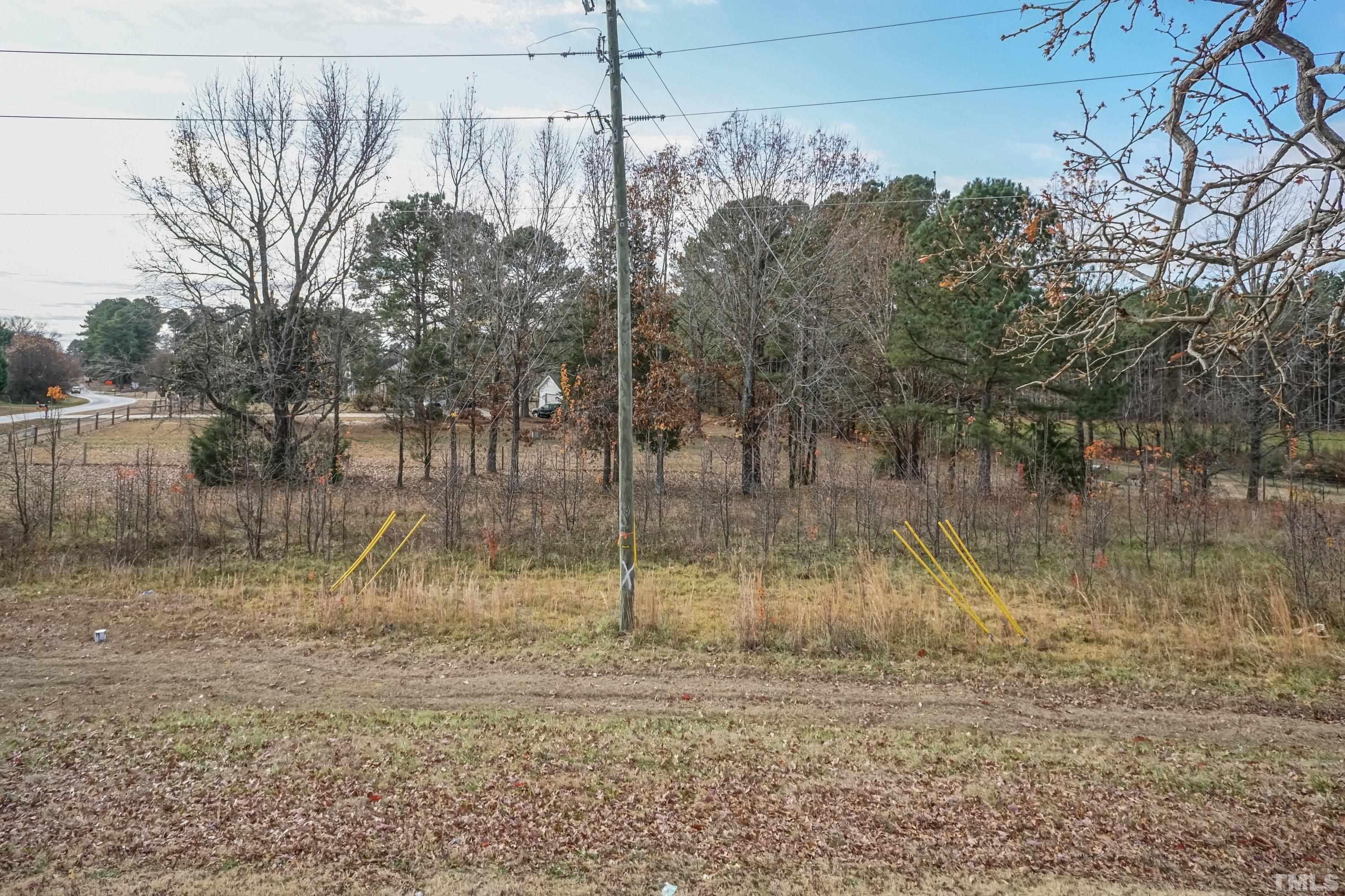 Bethlehem Road Raleigh, NC 27610 - Photo 4 of 7 a backyard of a house with lots of green space