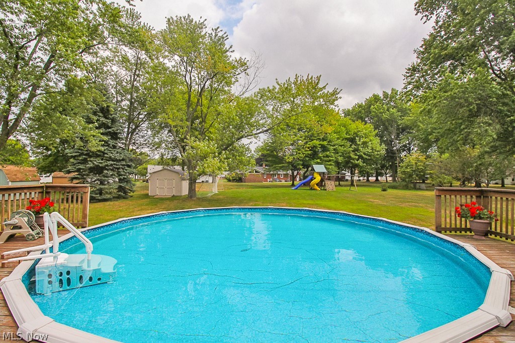989 Millridge Road Cleveland, OH 44143 - Photo 33 of 35 The above ground pool and view of the spacious backyard.