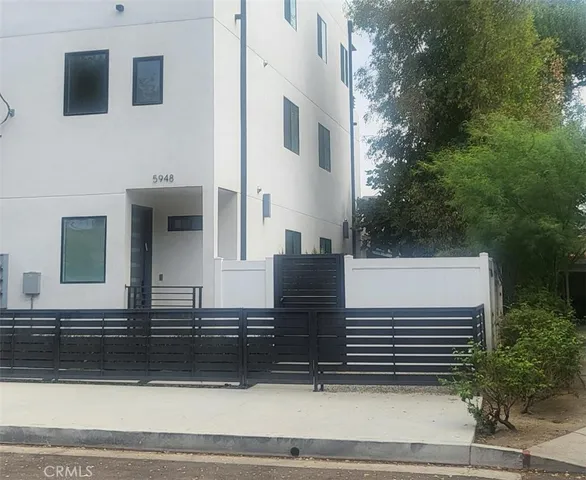 a view of entrance gate of a house