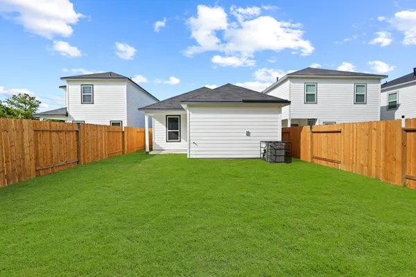 a view of a backyard with a garden