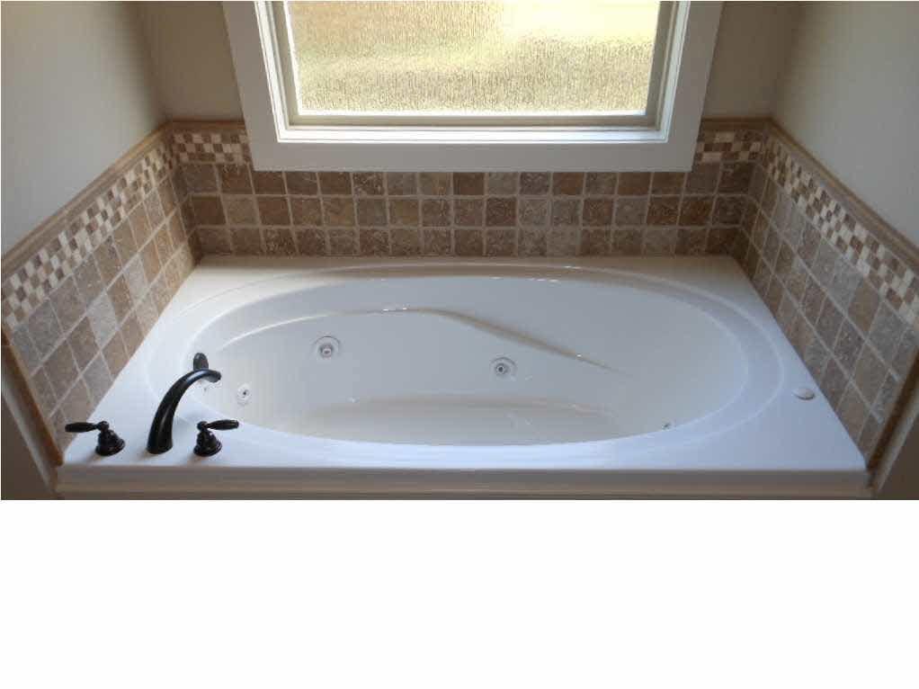 129 Busick Well Road Brandon, MS 39042 - Photo 17 of 28 Jacuzzi tub in master bath