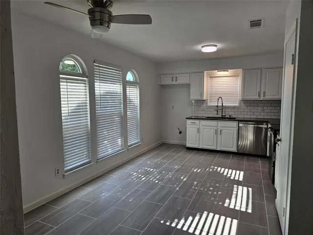 a view of a kitchen from the kitchen