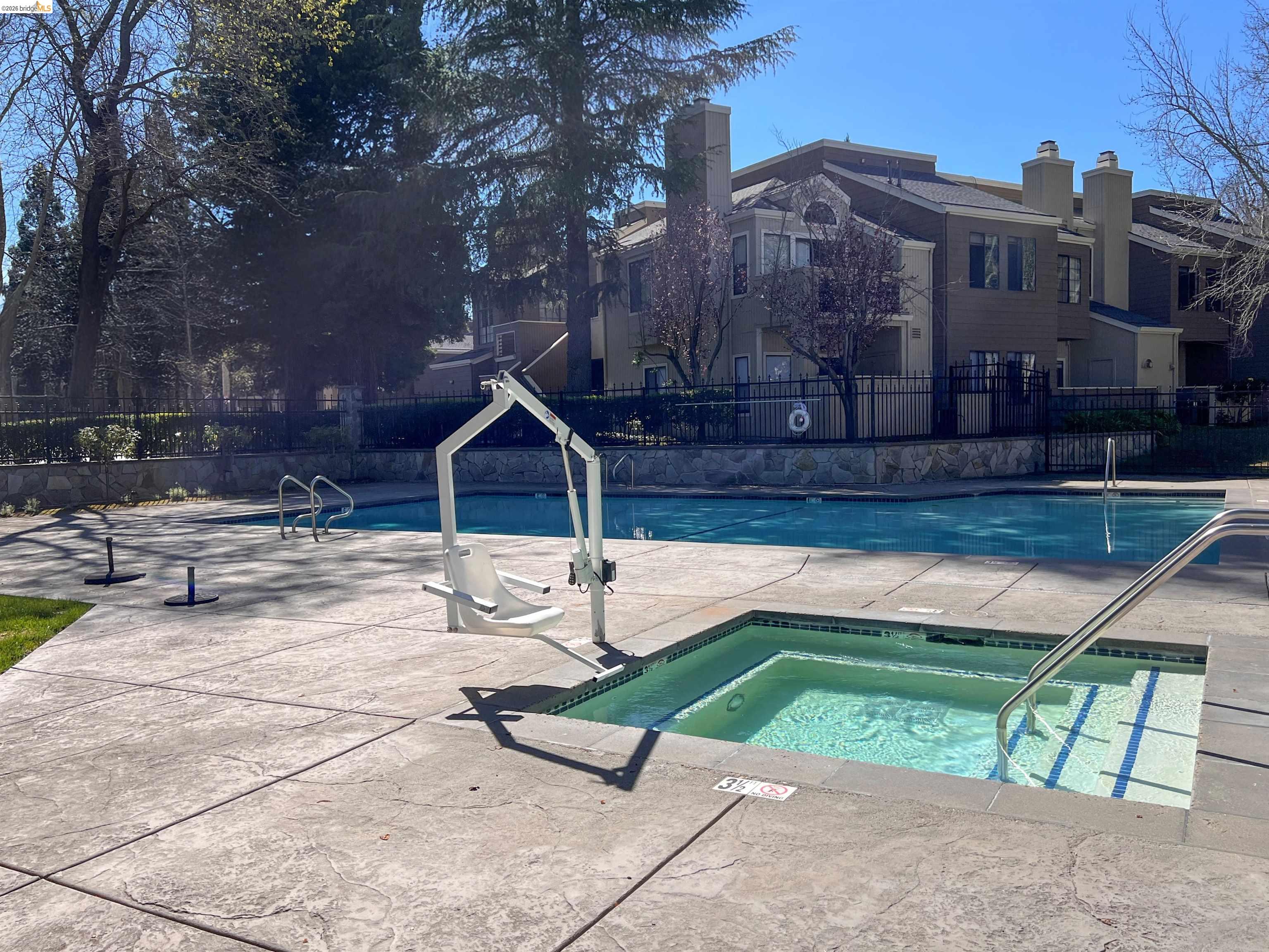 450 Pine Ridge Drive San Ramon, CA 94582 - Photo 16 of 18 a view of backyard with a patio and a fire pit