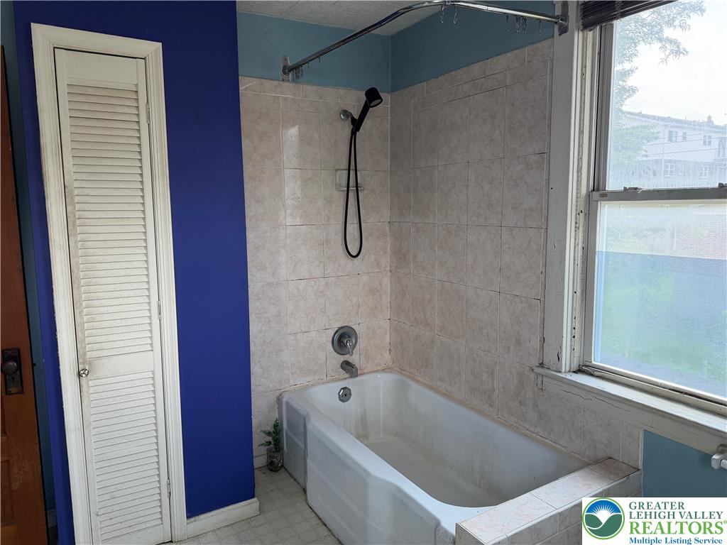 144 South Front Street Coplay, PA 18037 - Photo 16 of 24 Second floor bathroom with classic bathtub/shower with linen closet