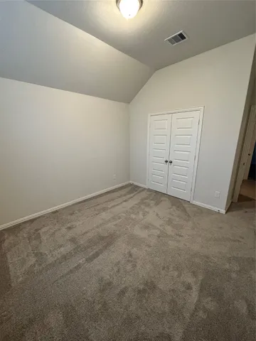 an empty room with closet
