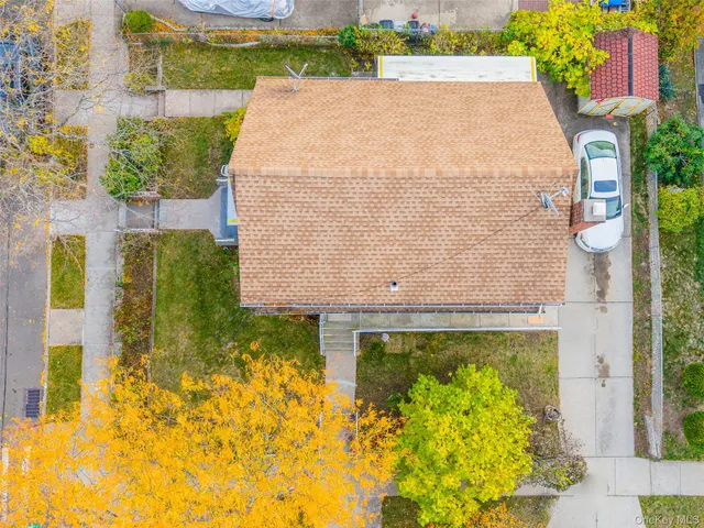 a picture of a bench in front of a window