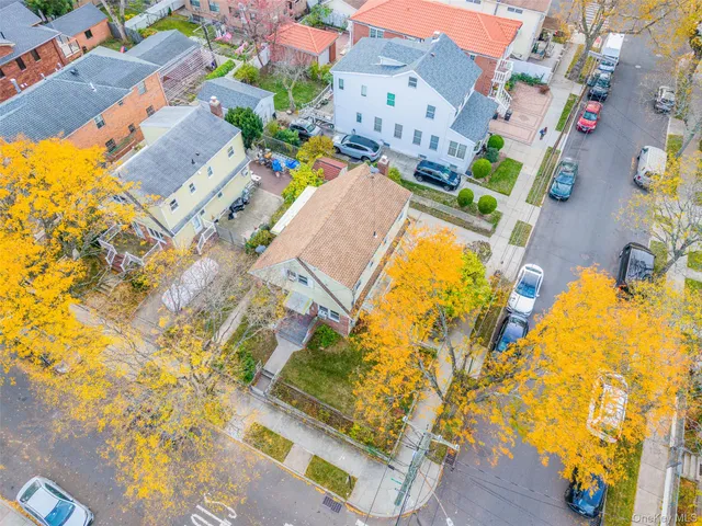a small pool with trees in the background