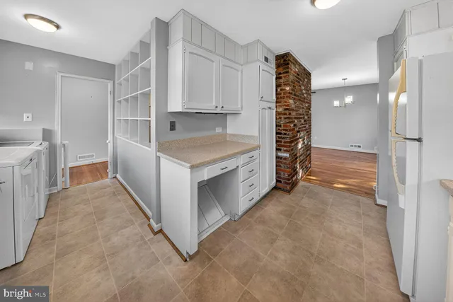 a view of kitchen and utility room