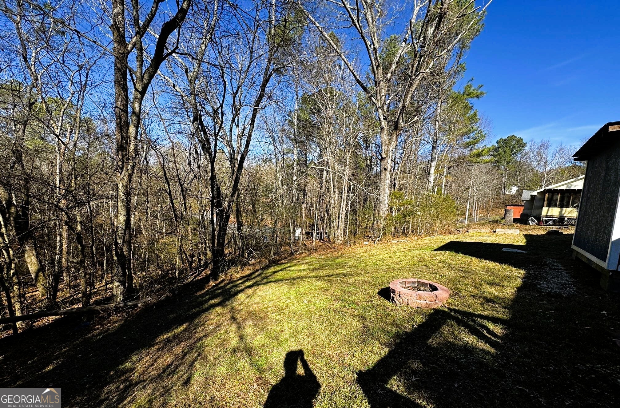 1614 Kendall Road Rocky Face, GA 30740 - Photo 4 of 10 a view of yard with swimming pool outdoor seating and trees