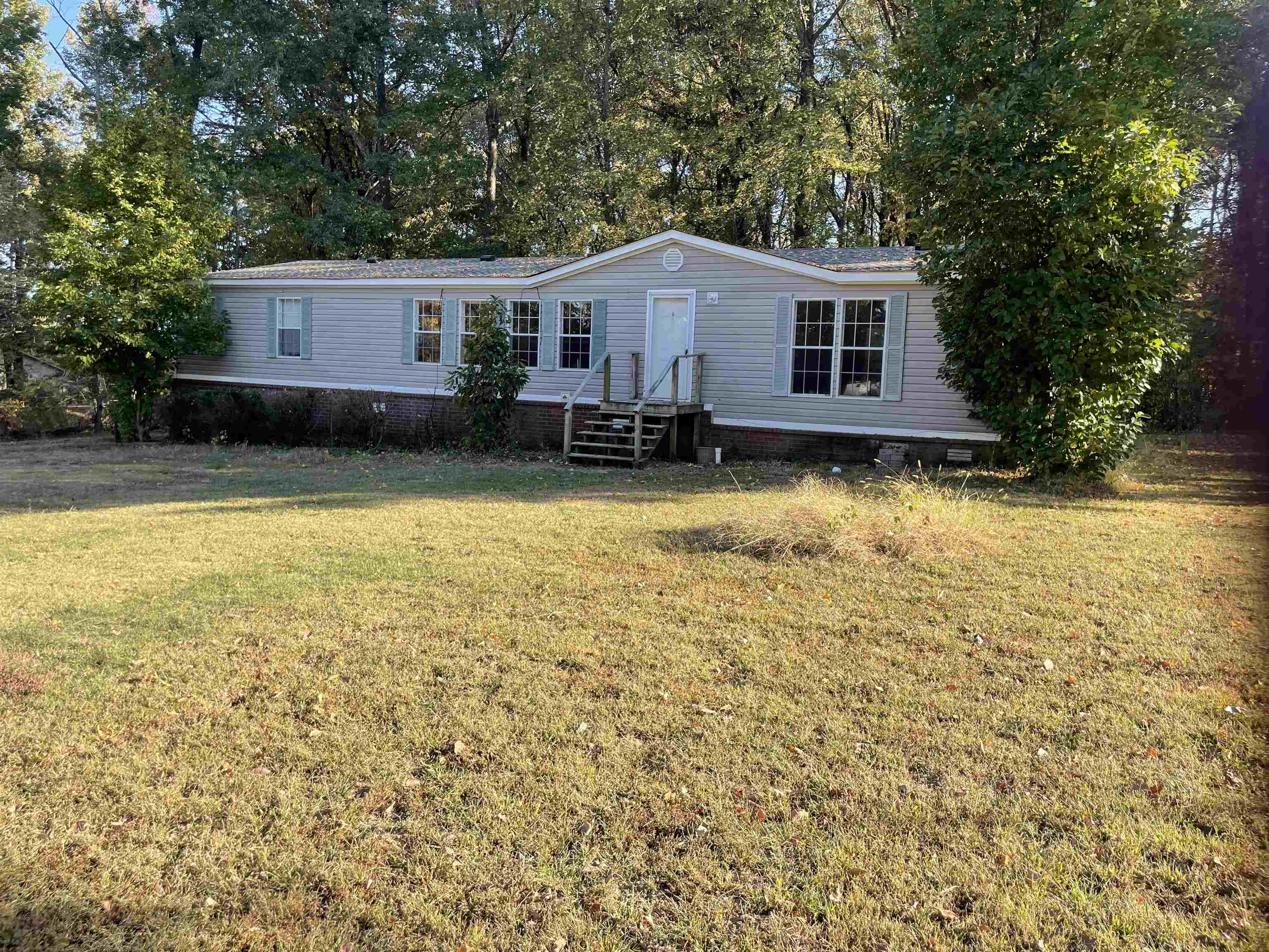 709 Robertson Road Mason, TN 38049 - Photo 1 of 16 a view of house with swimming pool